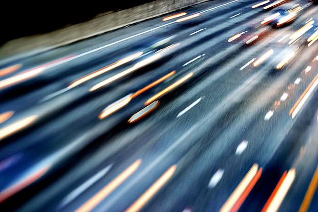 Blurry car trails photographed from above