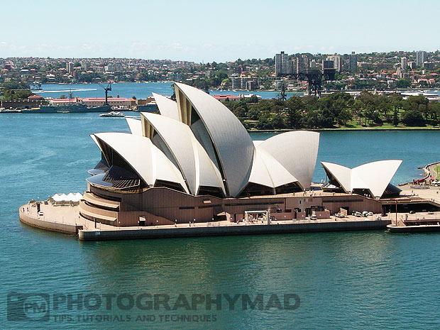 The image with a black logo watermark